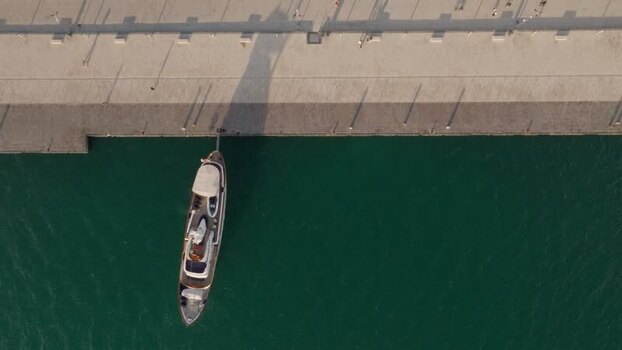 Aerial view of a boat docked at Island of Ortigia Italy.