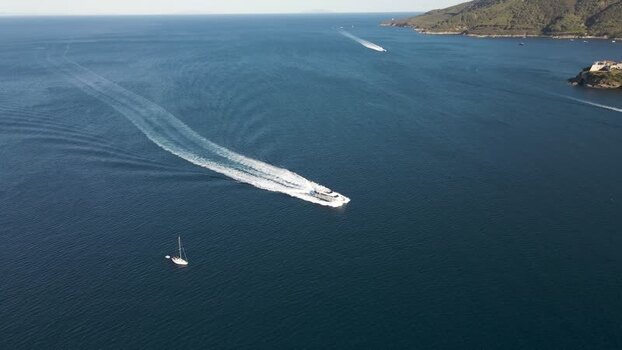 Aerial View of a motorboat along the coast Elba Island Italy.