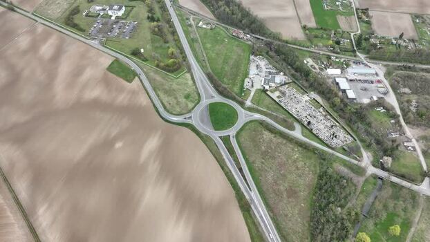 Aerial view of roundabout and cemetery France.