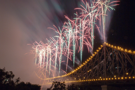 View of fireworks exploding over the Story Bridge at night in Brisbane Queensland Australia.