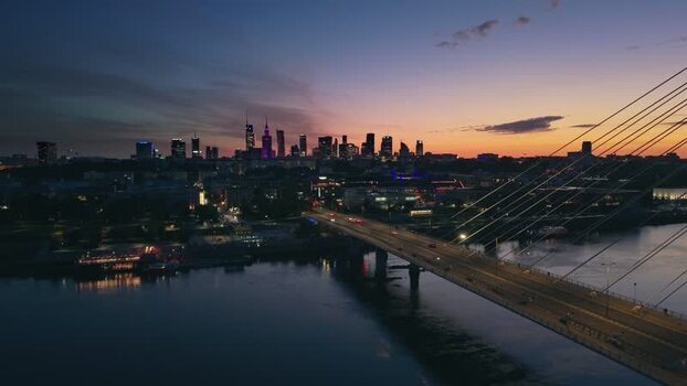 Aerial view of Warsaw skyline at sunset over Vistula River Poland.