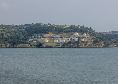 Aerial view of the energy silos situated on a green hillside overlooking the Tagus River in Lisbon Lisbon Portugal.