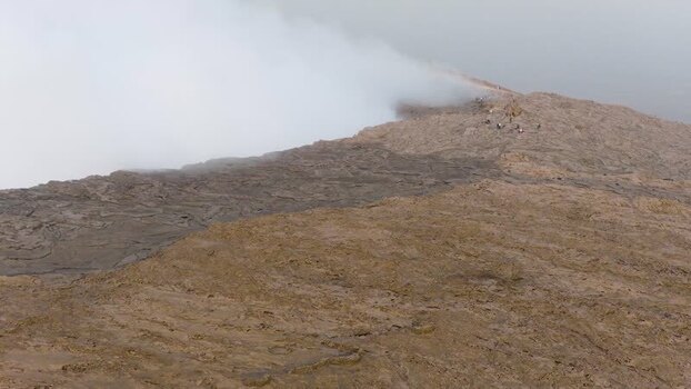 Aerial view of Erta Ale Volcano with smoke rising in Afar Ethiopia. Aerial view of Erta Ale Volcano with smoke rising in Afar Ethiopia.