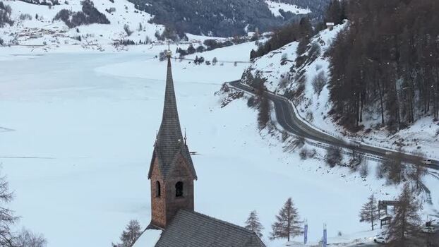 Aerial view of the sunken church tower in Reschensee Italy. Aerial view of the sunken church tower in Reschensee Italy.