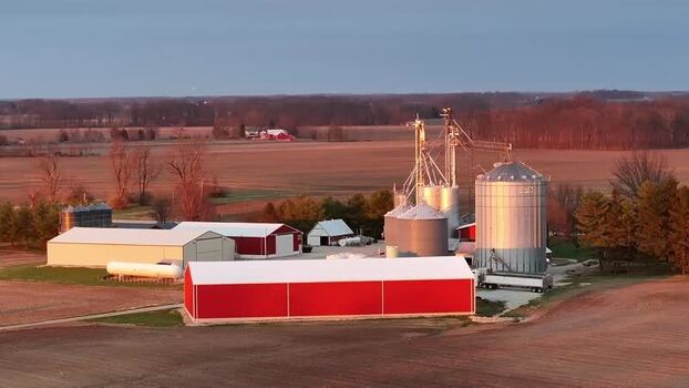 Aerial view of farm buildings and grain silos in rural Ohio United States. Aerial view of farm buildings and grain silos in rural Ohio United States.