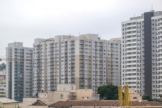 View of modern high rise residential apartment buildings under an overcast sky in the urban landscape of Rio de Janeiro Rio de Janeiro Brazil.