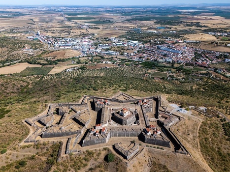 Elvas Portugal 10 September 2026 Aerial view of Forte de Nossa Senhora da Graca a star shaped fortress with stone walls and bastions overlooking the town of Elvas and rural landscape. Elvas Portugal 10 September 2026 Aerial view of Forte de Nossa Senhora da Graca a star shaped fortress with stone walls and bastions overlooking the town of Elvas and rural landscape.