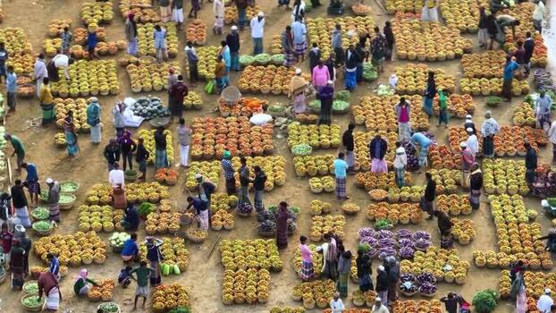 Aerial view of a bustling vegetable market in Sylhet Bangladesh.