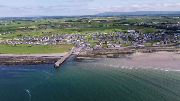 Aerial view of Enniscrone Pier and coastline in Ireland. Aerial view of Enniscrone Pier and coastline in Ireland.