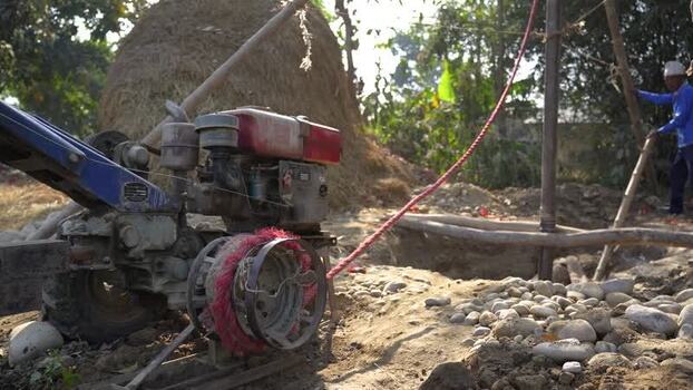 View of a diesel engine powering a drilling rig in Nepal. View of a diesel engine powering a drilling rig in Nepal.