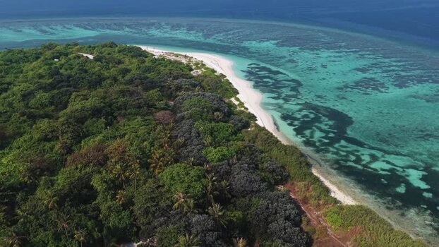 Aerial view of tropical island coastline in Vaikaradhoo Maldives. Aerial view of tropical island coastline in Vaikaradhoo Maldives.