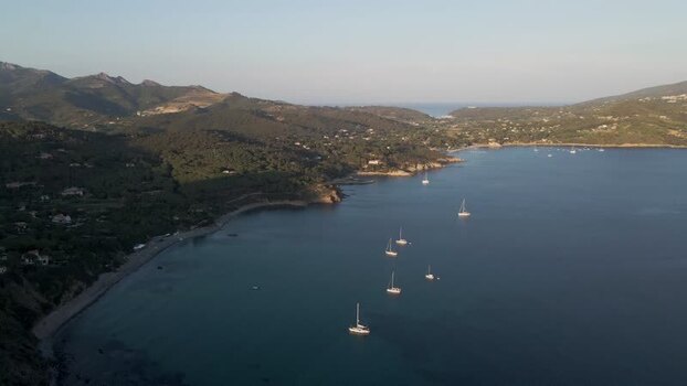 Aerial View of the coastline at sunset Seccheto Elba Island Tuscany Italy.