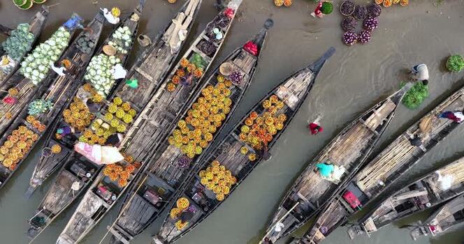 Aerial view of a floating market with boats and produce Bangladesh.
