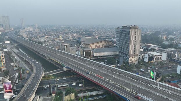Bekasi Barat West Java Indonesia 20 June 2026 Aerial view of an elevated highway and urban landscape with multi lane roads commercial buildings and dense city infrastructure. Bekasi Barat West Java Indonesia 20 June 2026 Aerial view of an elevated highway and urban landscape with multi lane roads commercial buildings and dense city infrastructure.