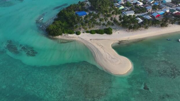Aerial view of a tropical island and sandbar Maldives. Aerial view of a tropical island and sandbar Maldives.
