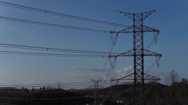 Aerial view of power lines over the hills Portugal.