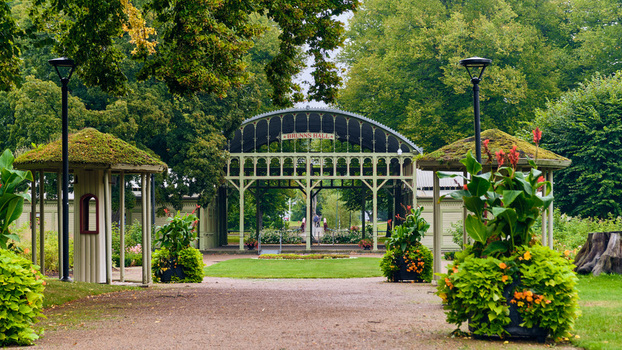 Ronneby Blekinge County Sweden 11 September 2025 View of Brunssparken featuring the historic Brunnshallarna pavilion surrounded by lush gardens green lawns and mature trees. Ronneby Blekinge County Sweden 11 September 2025 View of Brunssparken featuring the historic Brunnshallarna pavilion surrounded by lush gardens green lawns and mature trees.