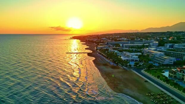 Aerial view of sunset over the coast of Crete Greece.