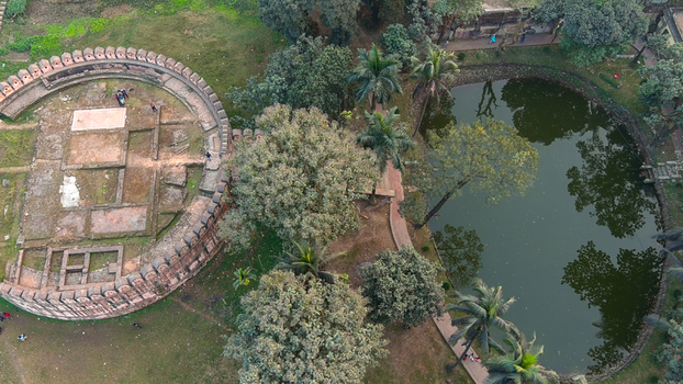 Aerial view of the ancient Idrakpur Fort ruins standing in stark contrast to the tranquil reflective pond nearby Munshiganj Bangladesh. Aerial view of the ancient Idrakpur Fort ruins standing in stark contrast to the tranquil reflective pond nearby Munshiganj Bangladesh.