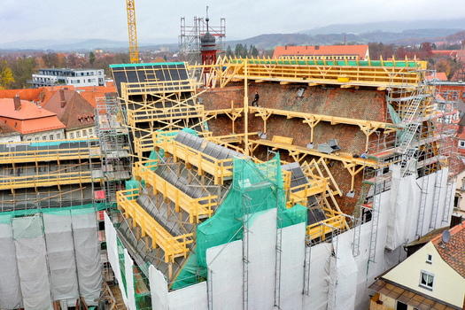 Aerial view of Rathaus Forchheim under renovation with scaffolding and wooden roof structures in Forchheim Bayern Germany. Aerial view of Rathaus Forchheim under renovation with scaffolding and wooden roof structures in Forchheim Bayern Germany.