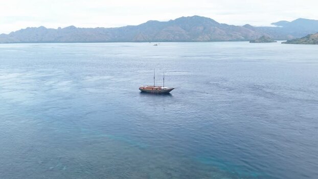 Aerial view of a wooden boat near Komodo Island Indonesia.