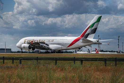 Berlin Germany 09 June 2026 View of an Emirates Airbus A380 taxiing at the ILA Berlin Air Show at Berlin Airport under a cloudy sky.