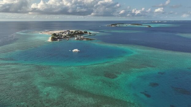 Aerial view of tropical islands and coral reefs Maldives. Aerial view of tropical islands and coral reefs Maldives.
