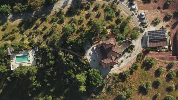 Aerial view of a luxury villa with a pool in El Tarajal Spain.