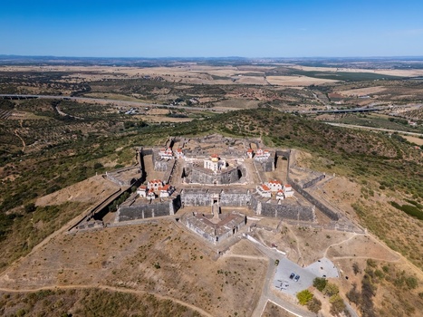 Elvas Portugal 10 September 2026 Aerial view of the star shaped Forte de Nossa Senhora da Graca a historic fortification on a hilltop surrounded by dry rolling landscape. Elvas Portugal 10 September 2026 Aerial view of the star shaped Forte de Nossa Senhora da Graca a historic fortification on a hilltop surrounded by dry rolling landscape.