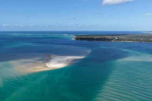 Aerial view of the sandbank at Amity Point in Moreton Bay with turquoise waters and the coastline of Minjerribah North Stradbroke Island Amity Point Queensland Australia. Aerial view of the sandbank at Amity Point in Moreton Bay with turquoise waters and the coastline of Minjerribah North Stradbroke Island Amity Point Queensland Australia.