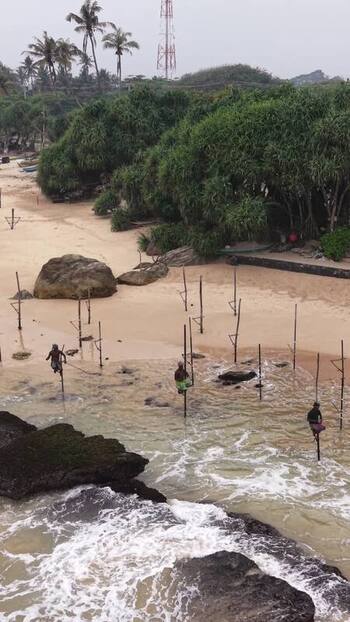 Aerial view of stilt fishermen in the ocean Sri Lanka. Aerial view of stilt fishermen in the ocean Sri Lanka.