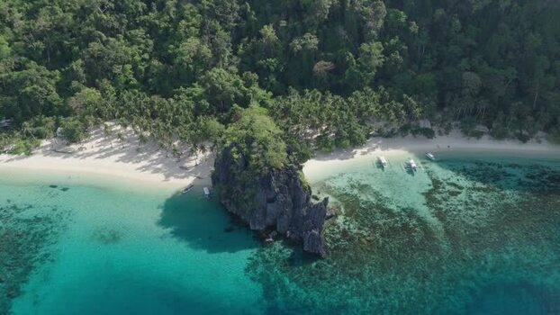 Aerial view of Papaya Beach and limestone rocks Philippines. Aerial view of Papaya Beach and limestone rocks Philippines.