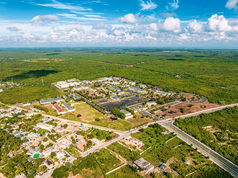 Aerial view of the Base de Infanteria de Marina Valm Manuel Ramon Montes Arache surrounded by lush green vegetation and roads in Boca Chica Santo Domingo Dominican Republic. Aerial view of the Base de Infanteria de Marina Valm Manuel Ramon Montes Arache surrounded by lush green vegetation and roads in Boca Chica Santo Domingo Dominican Republic.