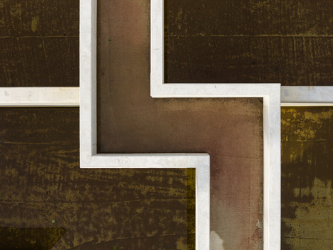 Aerial view of abstract concrete infrastructure and water treatment channels forming geometric patterns in Diepenbeek Flanders Belgium. Aerial view of abstract concrete infrastructure and water treatment channels forming geometric patterns in Diepenbeek Flanders Belgium.