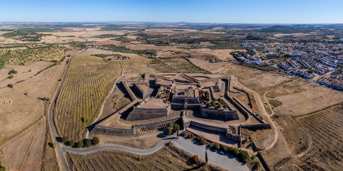 Elvas Portugal 10 September 2026 Aerial view of Forte de Nossa Senhora da Graca a star shaped fortress surrounded by dry fields and rural landscape. Elvas Portugal 10 September 2026 Aerial view of Forte de Nossa Senhora da Graca a star shaped fortress surrounded by dry fields and rural landscape.