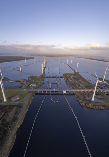 Aerial view of the Krammer locks surrounded by wind turbines and water in Bruinisse Zeeland Netherlands. Aerial view of the Krammer locks surrounded by wind turbines and water in Bruinisse Zeeland Netherlands.
