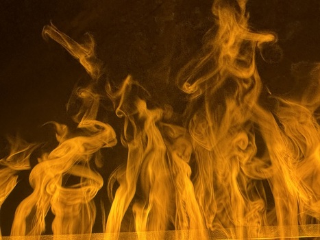 View of flickering orange flames in an electric fireplace in a spa setting in Banya Blagoevgrad Province Bulgaria.