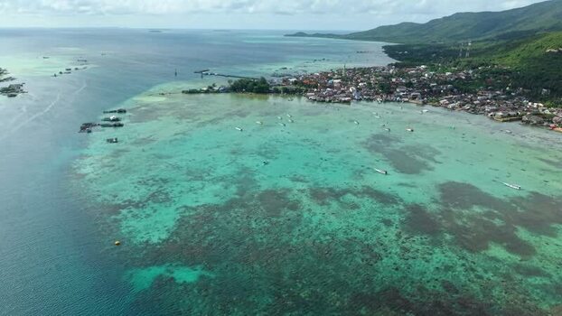 Aerial view of houses on the coast Indonesia. Aerial view of houses on the coast Indonesia.
