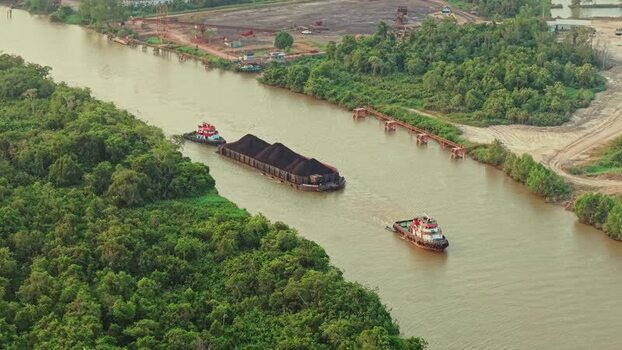 Aerial view of coal barge in Delta Mahakam Indonesia.