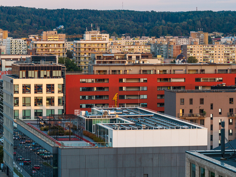 Aerial view of the urban landscape of Vilnius featuring modern apartment buildings historic architecture and dense residential rooftops in Vilnius Vilnius County Lithuania. Aerial view of the urban landscape of Vilnius featuring modern apartment buildings historic architecture and dense residential rooftops in Vilnius Vilnius County Lithuania.