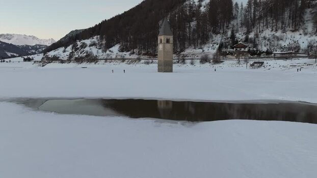 Aerial view of the sunken church tower in Reschensee Italy. Aerial view of the sunken church tower in Reschensee Italy.