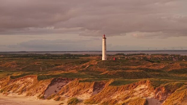 Aerial view of Lyngvig Lighthouse in coastal dunes Denmark.