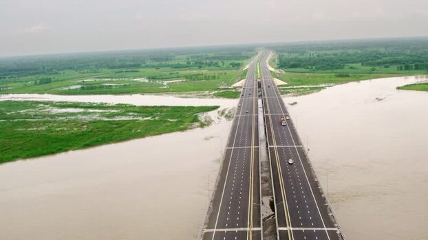Aerial view of Ganga Expressway bridge over river in India.
