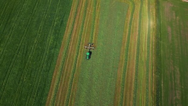 Aerial view of tractor in Stardalen field Norway.