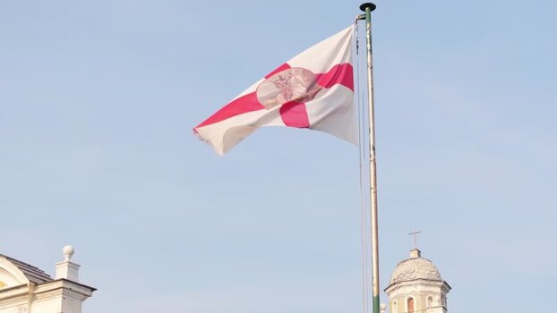 Aerial view of the flag of Portofino waving in Italy. Aerial view of the flag of Portofino waving in Italy.