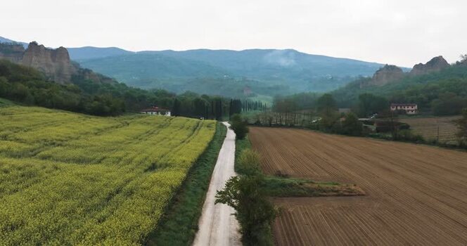Aerial view of Balze del Valdarno rock formations and green fields Italy. Aerial view of Balze del Valdarno rock formations and green fields Italy.