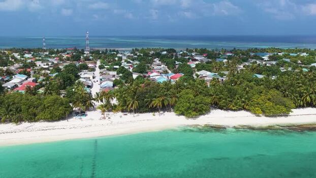 Aerial view of the tropical island of Makunudhoo Maldives. Aerial view of the tropical island of Makunudhoo Maldives.