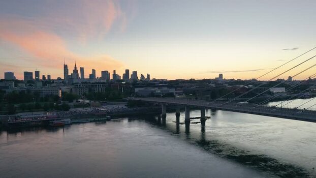 Aerial view of Warsaw skyline at sunset over Vistula River Poland.
