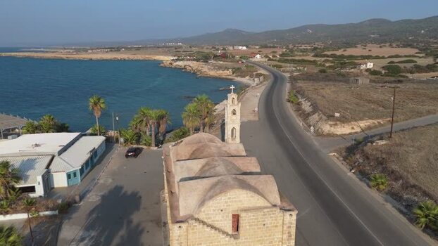 Aerial view of historic church by the sea in Northern Cyprus.
