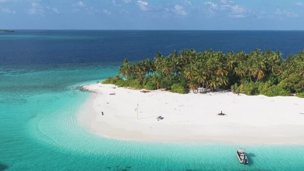 Aerial view of a tropical island with palm trees Maldives. Aerial view of a tropical island with palm trees Maldives.